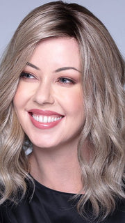 This beautiful "lob" has uniform length and soft waves that barely sweeps the shoulders