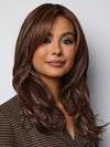 Model is wearing MARGO in color GLAZED AUBURN R | Stunning fusion of deep red, medium copper, and dark chocolate root.