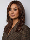 Model is wearing MARGO in color GLAZED AUBURN R | Stunning fusion of deep red, medium copper, and dark chocolate root.