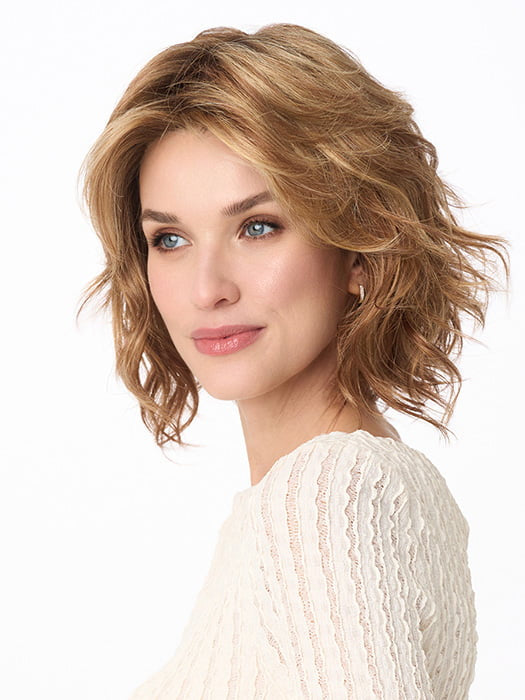 Model is wearing MARSHA by ENVY in color GOLDEN NUTMEG | Medium Brown roots with overall Warm Cinnamon base and Golden Blonde Highlights