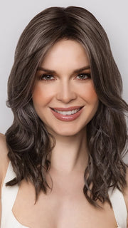 Model is wearing MAUDE by Amore in color MUSHROOM-GREY-R | Dark brown incorporates light brown and silvery grey tones with shadow roots for a stylish finish.