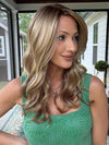 Jenna Fail @jenna_fail wearing MAYA HAND TIED by ENVY in color SPARKLING CHAMPAGNE | Medium Brown roots with overall Strawberry Blonde base and soft Golden Blonde highlights