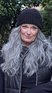 Mel B. @mels.be.ageless wearing BROOKLYN by RENE OF PARIS in color SALT-&-PEPPER-MR | A 50/50 Blend of Deep Charcoal Grey and Light Alabaster Grey Tones with a Micro Root 