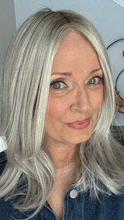 Mel B. @mels.be.ageless wearing NOBLESSE by ELLEN WILLE in color METALLIC BLONDE SHADED 60.101.51 | Pearl White, Pearl Platinum with Dark and Lightest Brown and Grey Blend with Shaded Roots