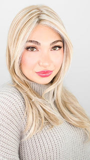 Maha wearing MESMERIZED by RAQUEL WELCH in RL19/23 BISCUIT | Light Ash Blonde Evenly Blended with Cool Platinum Blonde