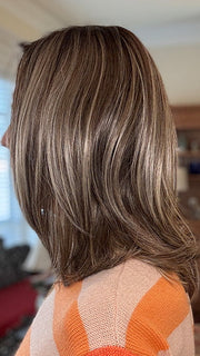 Eileen @crazywiglady is wearing MIKA by RENE OF PARIS in color TRES CHOCOLATE R | Carefully placed White, Medium, and Dark Chocolate tones completed with a Dark Brown Root. This color is perfect for both Blond and Brown enthusiasts