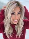 Nichole Corbett @nicholealee wearing MILANO by BELLE TRESS in color MILKSHAKE BLONDE R | A mixture of Light Sandy Brown, Highlighted with Light Ash Blonde with a Hint of Light Platinum Blonde with a Medium Root Color