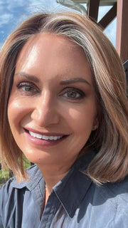 Emily H. @she_sheds_more wearing Mira by Amore in shade CINNAMON FROST R | Warm, medium coppery-brown base with white-blond highlights. The medium brown root color adds a realistic vibe.