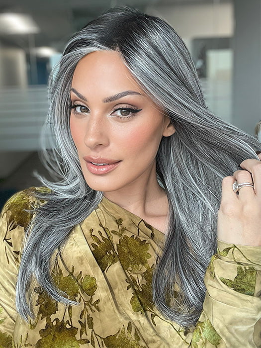 Model is wearing MIRROR MOMENT by GABOR in color GF44-60SS SUGARED LICORICE | Salt Dark Brown with Subtle Warm Highlights Roots