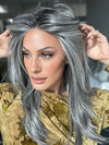 Model is wearing MIRROR MOMENT by GABOR in color GF44-60SS SUGARED LICORICE | Salt Dark Brown with Subtle Warm Highlights Roots