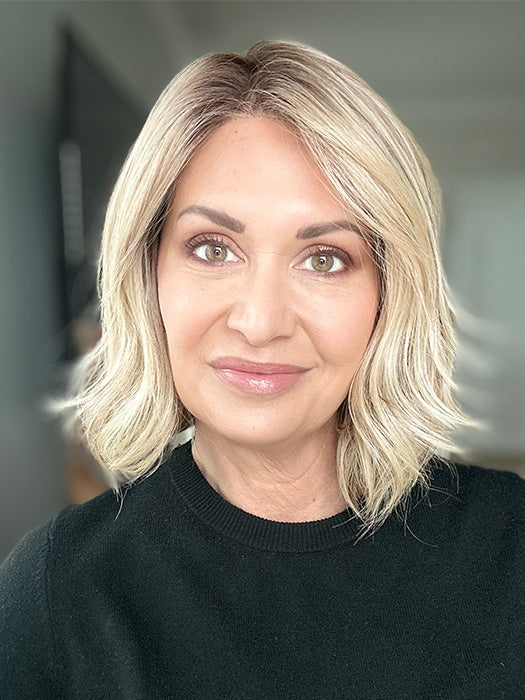 Emily H. @she_sheds_more wearing NEWPORT by BELLE TRESS in color RAW SUGAR BLONDE | A Neutral Light Blonde, Honey Blonde, Pale Gold Blonde, with a base of Light Brown Low Lights featuring a Medium Root Color