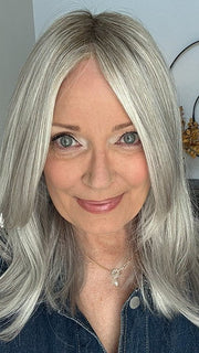 Mel B. @mels.be.ageless wearing NOBLESSE by ELLEN WILLE in color METALLIC BLONDE SHADED 60.101.51 | Pearl White, Pearl Platinum with Dark and Lightest Brown and Grey Blend with Shaded Roots