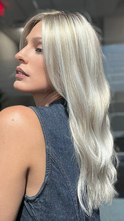 Model is wearing OLIVIA by JON RENAU in color FS17/101S18 PALM SPRINGS BLONDE | Light Ash Blonde with Pure White Natural Violet Bold Highlights, Shaded with Dark Natural Ash Blonde 