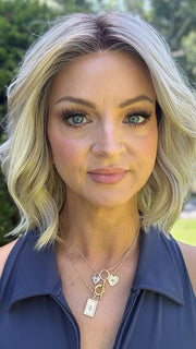 Sandy @i_be_wiggin wearing OLIVIA by BELLE TRESS in color BISCOTTI CREME R | A soft, dimensional blonde shade that blends warm, golden-beige tones with light, creamy highlights for a sunlit, natural look.