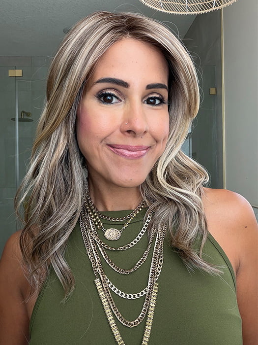 Lorena @faux.hurr.lifee wearing OXFORD by BELLE TRESS in color MACADAMIA LATTE R | A combination of Medium and Light Brown, highlighted with Light Gold Blonde, and a mixture of Ash Blonde and Light Gold Blonde, Rooted with Medium and Light Brown