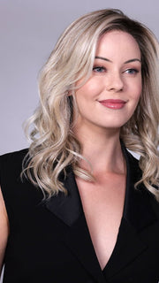 Model is wearing OXFORD in coklor MILKSHAKE BLONDE R | A mixture of Light Sandy Brown, Highlighted with Light Ash Blonde with a Hint of Light Platinum Blonde with a Medium Root Color