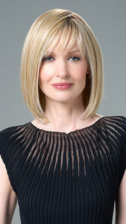 Model wearing PAIGE by ENVY in SILKY BEIGE | Light Platinum Blonde with Dark Brown Roots