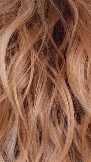 PEACHES-AND-CREAM | A vibrant peach blonde with creamy undertones and bright, face-framing cream highlights. Rich chocolate root adds depth.