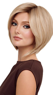 Model is wearing POISED by TressAllure in color 19/23/R12 | A beautiful blend of Platinum Blonde and Pale Golden Blonde, shaded with Dark roots