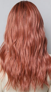 Model is wearing POSH WAVEZ in DUSTY ROSE | Medium Coral Red Base with Dark Brown Roots