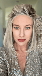 Jenny B. @thewiggygirl wearing CURRENT EVENTS by RAQUEL WELCH WIGS in color RL16/22SS SHADED ICED SWEET CREAM | Pale Blonde with Slight Platinum Highlighting with Dark Roots