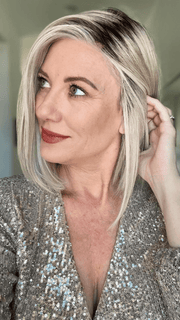 Jenny B. @thewiggygirl wearing CURRENT EVENTS by RAQUEL WELCH WIGS in color RL16/22SS SHADED ICED SWEET CREAM | Pale Blonde with Slight Platinum Highlighting with Dark Roots