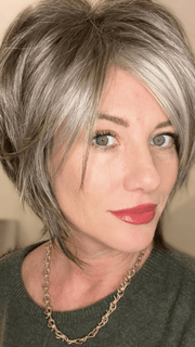 Jenny B. @thewiggygirl wearing REESE by NORIKO in color SANDY SILVER | Medium Brown Transitionally Blending to Silver and Dramatic Silver Bangs FB MAIN IMAGE