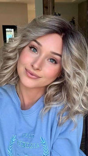 Heather @cjswigs wearing EMMA by ENVY BY ALAN EATON in color SPARKLING-CHAMPAGNE | Medium Brown roots with overall Strawberry Blonde base and soft Golden Blonde highlights