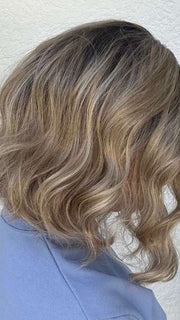 Heather @cjswigs wearing EMMA by ENVY BY ALAN EATON in color SPARKLING-CHAMPAGNE | Medium Brown roots with overall Strawberry Blonde base and soft Golden Blonde highlights
