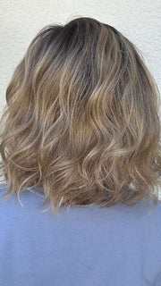 Heather @cjswigs wearing EMMA by ENVY BY ALAN EATON in color SPARKLING-CHAMPAGNE | Medium Brown roots with overall Strawberry Blonde base and soft Golden Blonde highlights
