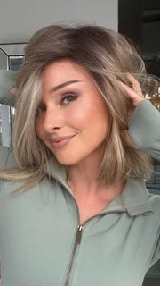 Heather @cjswigs wearing EMMA by ENVY BY ALAN EATON in color SPARKLING-CHAMPAGNE | Medium Brown roots with overall Strawberry Blonde base and soft Golden Blonde highlights | heat styled straight