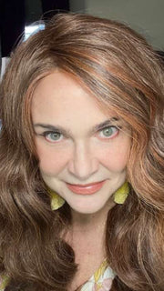 Tonya wearing DAY TO DATE by RAQUEL WELCH WIGS in color RL32/31 CINNABAR | Medium Dark Auburn Evenly Blended with Medium Light Auburn
