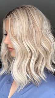 Sandy @i_be_wiggin wearing MIU V by BELLETRESS in color BURNT BISCUIT BLONDE | A Blend of Sand, Honey, and Creamy Soft Blonde with a Medium Root
