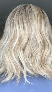 Sandy @i_be_wiggin wearing MIU by BELLETRESS in color BURNT BISCUIT BLONDE | A Blend of Sand, Honey, and Creamy Soft Blonde with a Medium Root
