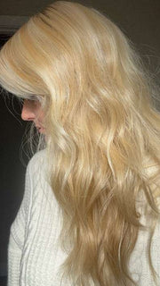Carlyn @carlynwilson84 wearing CALIFORNIA BEACH WAVES by TRESSALLURE in color 24/102/R12 | Gold Blonde with Platinum highlights with Gold Brown roots
