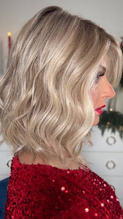 Sandy @i_be_wiggin wearing SIMMER by RAQUEL WELCH WIGS in color RL19/23SS SHADED BISCUIT | Light Ash Blonde Evenly Blended with Cool Platinum Blonde and Dark Roots
