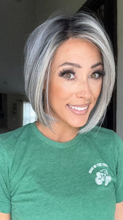 Nichole wearing DUA by ELLEN WILLE in DARK GREY FROSTED | A sophisticated, cool-toned grey with highlights that give your hair an icy, chic vibe.