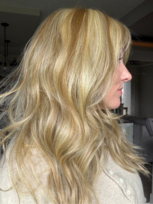 Carly wearing POSH WAVEZ by RENE OF PARIS in CREAMY TOFFEE R | Rooted Dark Blonde Evenly Blended with Light Platinum Blonde and Light Honey Blonde