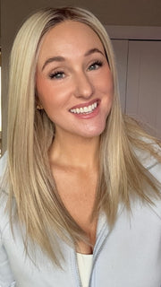 Carly wearing SLEEK by ELLEN WILLE in PEARL BLONDE ROOTED 101.20.25 | Pearl Platinum Blended with Light Strawberry Blonde and Lightest Golden Blonde with Shaded Roots