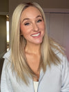 Carly wearing SLEEK by ELLEN WILLE in PEARL BLONDE ROOTED 101.20.25 | Pearl Platinum Blended with Light Strawberry Blonde and Lightest Golden Blonde with Shaded Roots