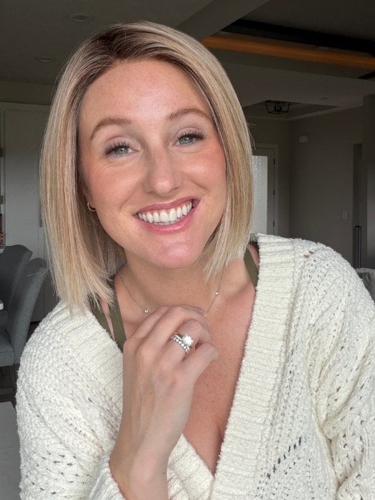 Carly wearing LIA ll by ELLEN WILLE in CANDY BLONDE ROOTED 101.27.60 | Pearl Platinum, Dark Strawberry Blonde, and Pearl White Blend with Dark Shaded Roots