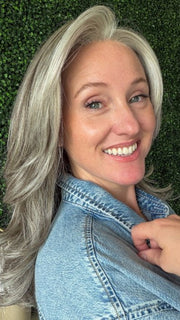 Carly wearing MARGO by RENE OF PARIS in SILVER STONE | Silver Medium Brown blend that transitions to more Silver then Medium Brown then to Silver Bangs