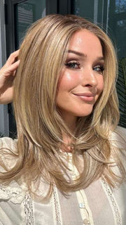 Heather @cjswigs wearing BEVERLY HILLS by BELLETRESS in color CARAMEL BLONDE R | Light Brown Rooted, with a blend of Light Gold Blonde, hint of Strawberry Blonde and Light Auburn with the balance of Cool, Light Blonde Highlights.