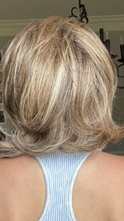 Crystal @crystallhoneycutt is wearing UPSTAGE LARGE by RAQUEL WELCH in RL12/22SS SHADED CAPPUCCINO | Light Golden Brown Evenly Blended with Cool Platinum Blonde Highlights with Dark Roots