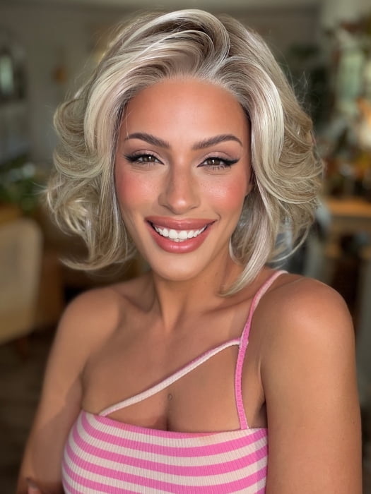 Roxie wearing ELIZABETH by JON RENAU in 101/88/27S8 CATALINA BLONDE | Pale blonde with Pure White Natural Violet halo highlights, shaded medium brown