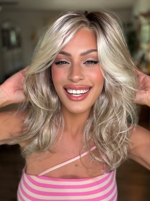 Roxie wearing ELIZABETH by JON RENAU in 101/88/27S8 CATALINA BLONDE | Pale blonde with Pure White Natural Violet halo highlights, shaded medium brown