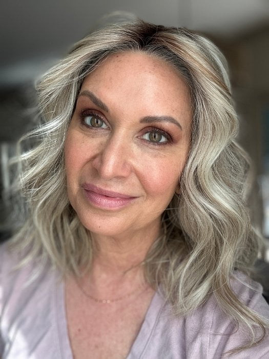 Emily H. wearing ANDIE by BELLETRESS in BUTTERBEER R | Dark Brown Base and Root that transitions smoothly into a buttery blonde, infused with creamy honey and toffee tones
