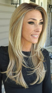 Nichole wearing KATNISS by BELLETRESS in BUTTERCAKE BLONDE-R | A neutral-warm blonde blend featuring light brown, ash, and lightest blonde tones with natural-looking darker roots for added depth and realism.