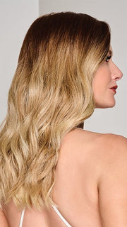 RL8/24OM | Medium brown blended roots that transition into a golden blonde ombré from midlength to the ends