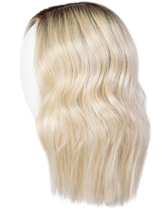A stunning shoulder-length wig with soft tumbled waves